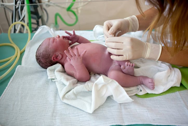 Newborn baby been examined immediately after childbirth